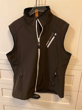 Abacus dark brown softshell zip vest with white trim